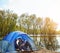 Create some camping romance in your life. an adventurous young couple at their campsite.