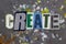 CREATE text word collage colorful fabric on painted gray denim, creative freedom