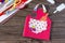 Creates a baby gift from a paper apron postcard for grandmother on mother`s day. Hand-made.