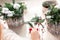 Creating Christmas floral arrangement with carnations, chrysanthemum santini flowers and fir