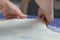 Creating homemade Phyllo or strudel dough on a home table cloth
