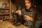 Creating the perfect fishing tackle. Shot of a man making fishing lures in his workshop.