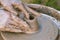 Creating a sculpture of clay close-up. Hands making products from clay. The sculptor at work