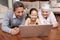 Creating social media profile for granny and gramps. A young girl and her grandparents lying on the floor looking at a