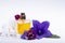 Creation of perfume essence, summer flowers sweet light fragrance, perfume bottle and colorful aromatic flowers isolated