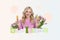 Creative 3d photo artwork collage of beautiful joyful girl hold carrot gingerbread cookies tulips spring easter topiary