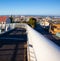 Creative angle from white metal railings on the bridge of Nelson Mandela Boulevard.