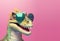 Creative animal concept. Dinosaur dino in sunglass shade glasses isolated on pastel background,. copy space text Generative AI