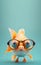 Creative animal concept. goldfish fish in sunglass glasses isolated on solid pastel background. copy space text Generative AI