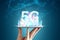 Creative background, 5G Smartphone and hologram smart city, big data transmission technology concept, 5G network, high speed