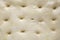 Creative background of focaccia dough - a traditional Italian bread. Holes in the dough for pouring olive oil - top view before