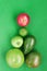 Creative background of green various summer tropical fruits. Food concept for fitness dinner,plant based diet,frutarian