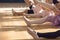 Creative Ballet Close Up Little Girls\' Legs stretching while sitting on floor in ballet class