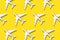 Creative banner of white planes on yellow background. Travel, vacation concept. Travel, vacation ban. Flights cancelled and