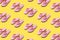 Creative beach slippers pattern on yellow background. Summer minimal concept