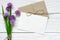 Creative branding mock up to display your artworks. blank greeting card with purple flower bouquet