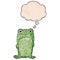 A creative cartoon staring frog and thought bubble in grunge texture pattern style