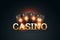 Creative casino background, inscription casino in gold letters playing cards roulette on a dark background. Flyer. Gambling