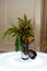 Creative centerpiece with vegetables and foliage