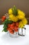 Creative centerpiece with vegetables and foliage