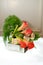 Creative centerpiece with vegetables and foliage