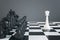Creative chess board on gray wallpaper with mock up place. Match and battle concept.