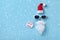 Creative Christmas background. Secret Santa card. Santa Claus hipster with hat, beard and sunglasses