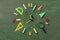 Creative clock face from colorful school supplies on blackboard top view and flat lay. Back to school and time to study concept