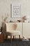 Creative composition of cozy living room interior design with mock up poster frame, fluffy armchair, coffee table, commode.