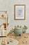 Creative composition of cozy scandinavian child`s room interior with mock up poster frame, plush and wooden toys and textile.