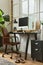 Creative composition of modern masculine home office workspace interior with black industrial desk, brown leather armchair, pc.