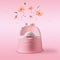 The creative concept of childhood. Pink baby potty with flowers and splashes on a pink background