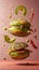 Creative Concept of a Floating Burger with Ingredients Suspended in Air on a Pink Background, Dynamic Food Photography