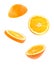 Creative concept with Flying orange. Sliced orange isolated on white background. Levity fruit floating in the air.