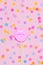 Creative confetti background vith pink lips