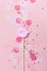 Creative confetti background vith pink lips. Top view