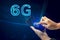 Creative connection background, mobile phone with 6G hologram on the background of the new world era, the concept of 6G network,