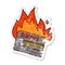 A creative distressed sticker of a burning credit card cartoon