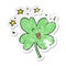 A creative distressed sticker of a happy cartoon four leaf clover