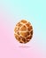 Creative Easter concept of animal giraffe print egg. Fashion style winner egg on pastel background
