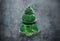 Creative edible Christmas tree made of fresh broccoli.Holiday ideas. New year food background top view