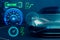 Creative electronic car dashboard interface hologram on blurry blue texture. Automobile, charging and futuristic technology