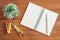 Creative flat lay photo of workspace desk. Office desk wooden table background with open mock up notebooks and pens.