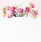 Creative flowers concept. Lovely colorful buttercups bunch layout with white frame background. Copy space for your design . Pastel