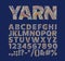 Creative font in the form of yarn threads. For decorative labels