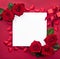 Creative frame of red roses, gift box and hearts