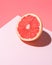 Creative fruit composition on pink background with hard shadows. Summer minimal concept