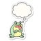 A creative grumpy cartoon frog and thought bubble as a printed sticker