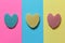 Creative heart from an edible wafer in pastel pink, blue, yellow