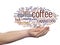 Creative hot coffee, cappuccino or espresso abstract word cloud in hand
